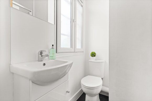 Property photo 1 of 6 E13Bathroom