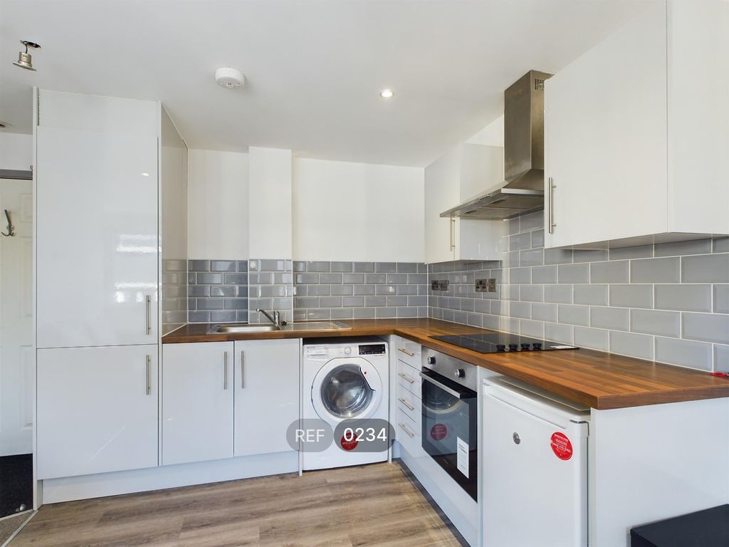 Property photo 2 of 8 Kitchen &amp; Living Area