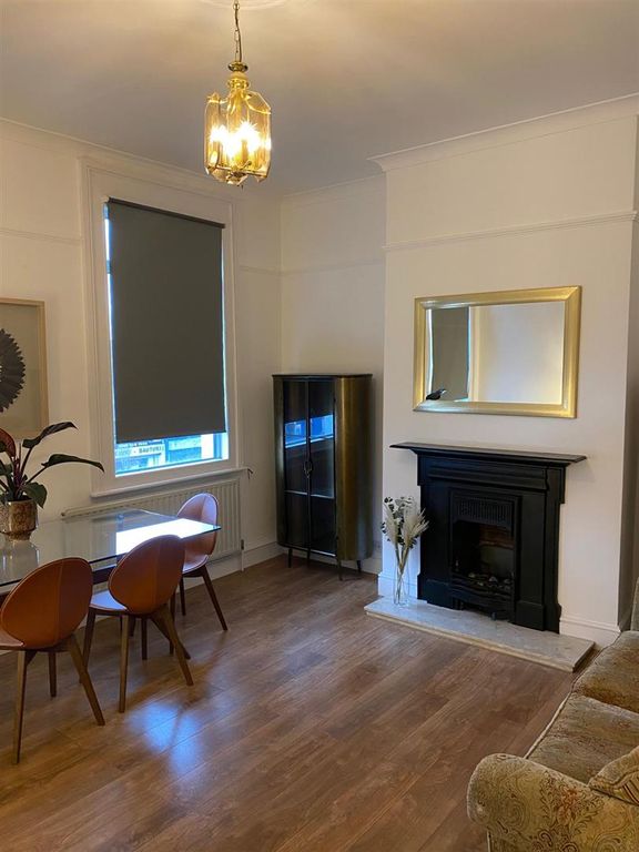 Property photo 3 of 12 Living/Dining Room