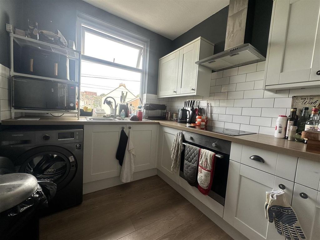 Property photo 1 of 9 Modern Kitchen With Subway Tiles And Large Window...