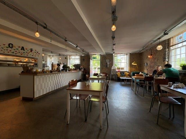 Property photo 2 of 11 Cafe Wide Shot.Jpg