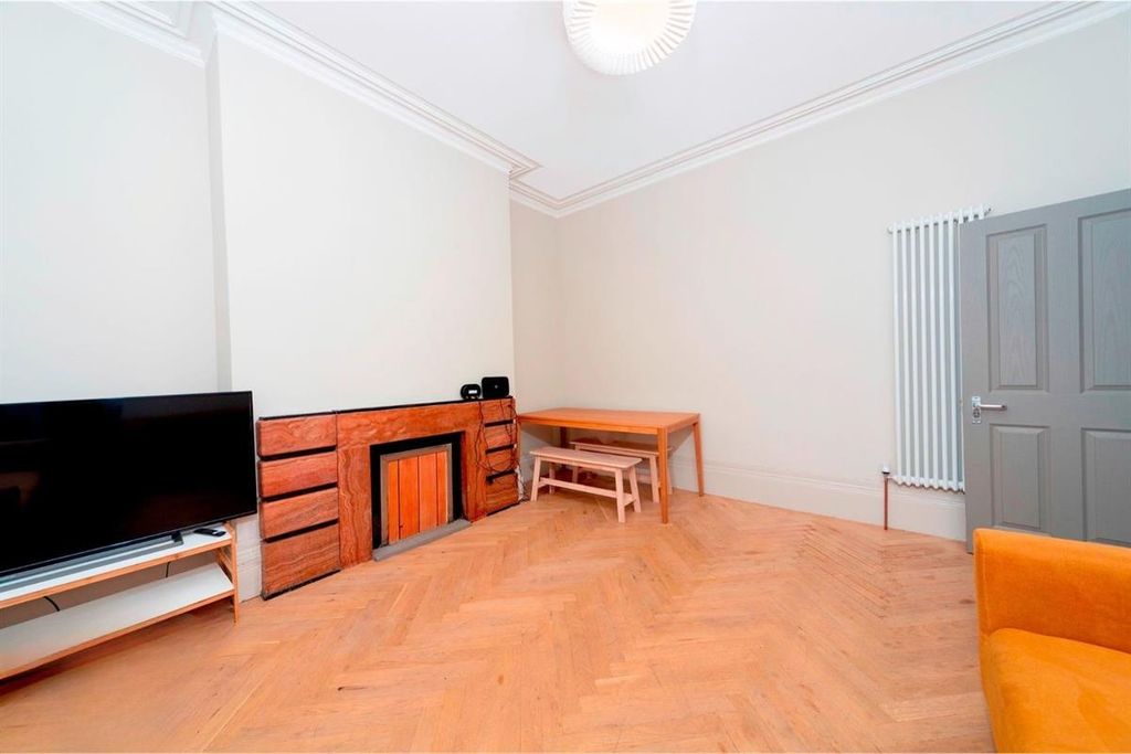 Property photo 2 of 9 Bright Living Room With Seating And Dining Area...