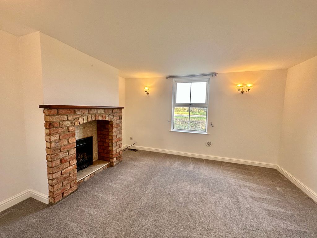 Property photo 3 of 12 Living Room