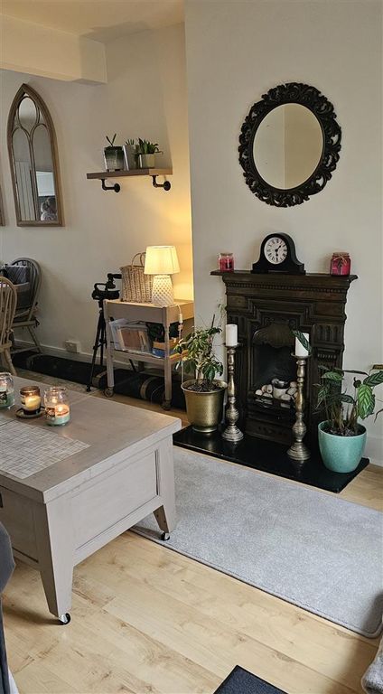 Property photo 3 of 9 Lounge Fireplace