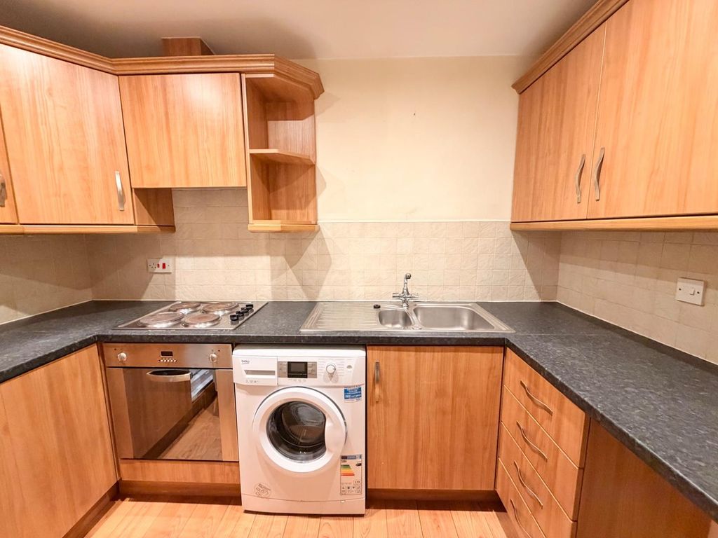 Property photo 3 of 7 Kitchen