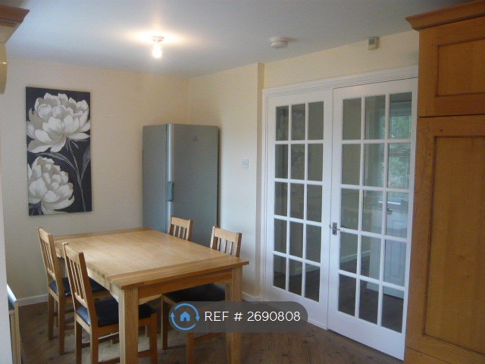 Property photo 3 of 9 Spacious Kitchen With Dining Area