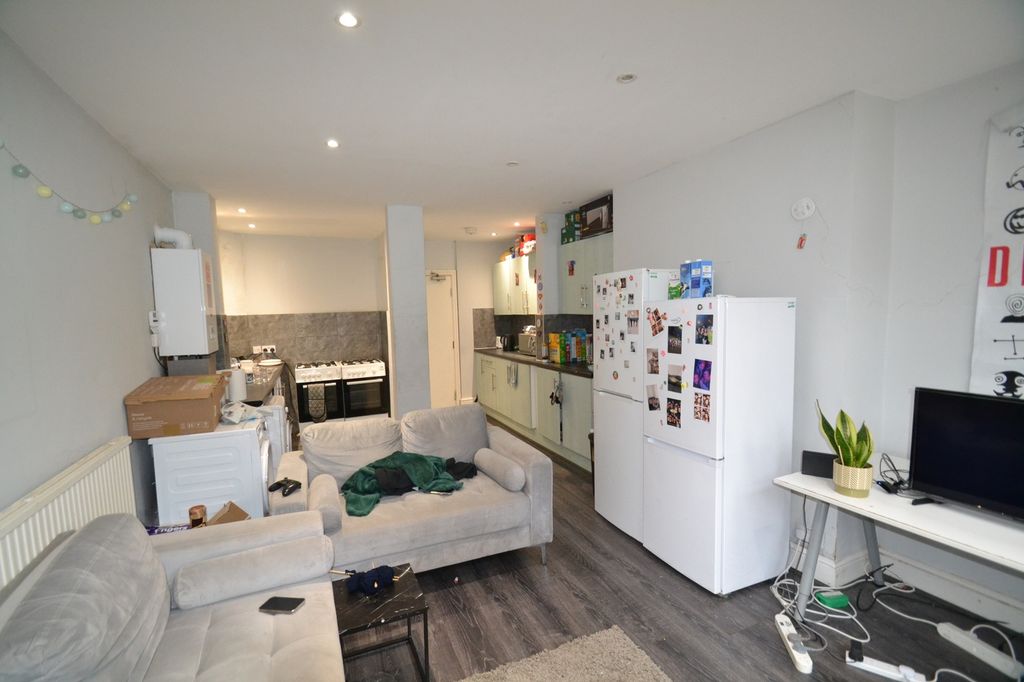 Property photo 1 of 32 A Cozy Living Room Featuring A Comfortable Sofa, m...