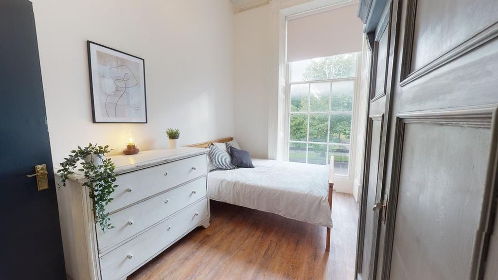 Property photo 3 of 4 A Bright And Inviting Double Bedroom Featuring Sty...