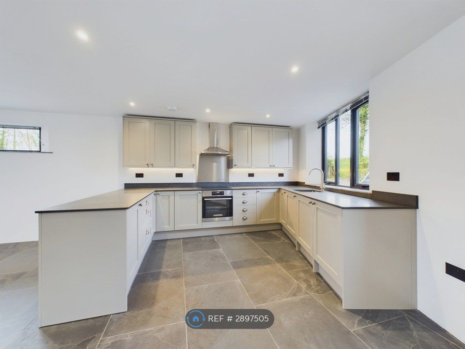 Property photo 2 of 8 Kitchen Area