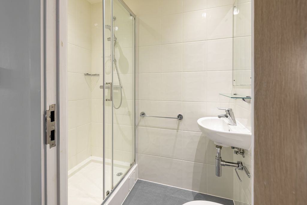 Property photo 3 of 3 A Modern And Clean Bathroom Featuring A Spacious S...