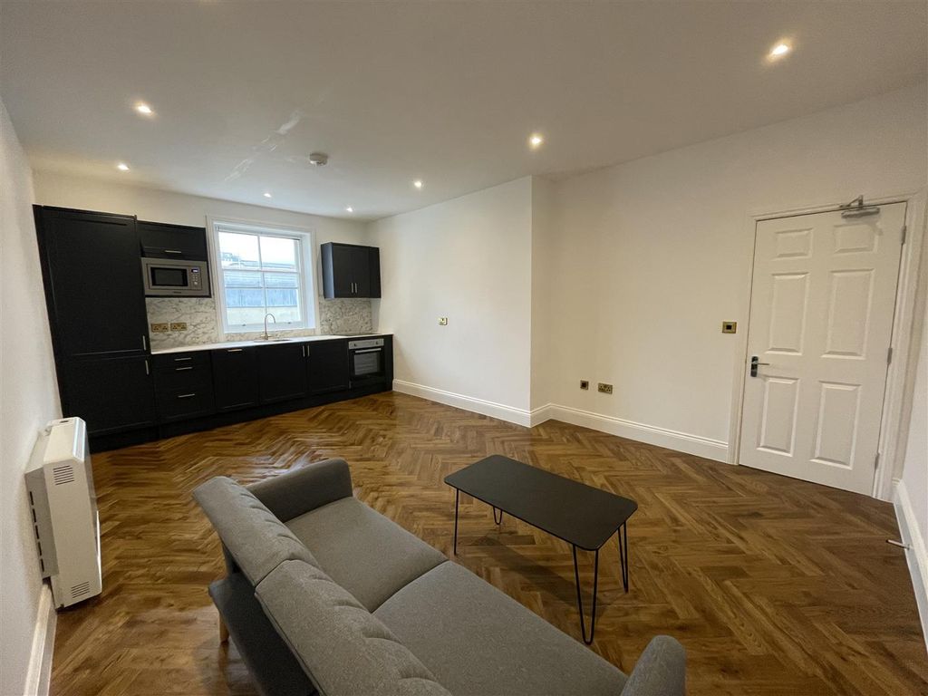 Property photo 1 of 6 Kitchen / Living Area