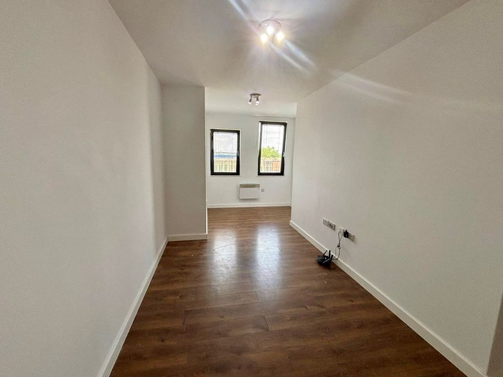 Property photo 3 of 7 Living Area