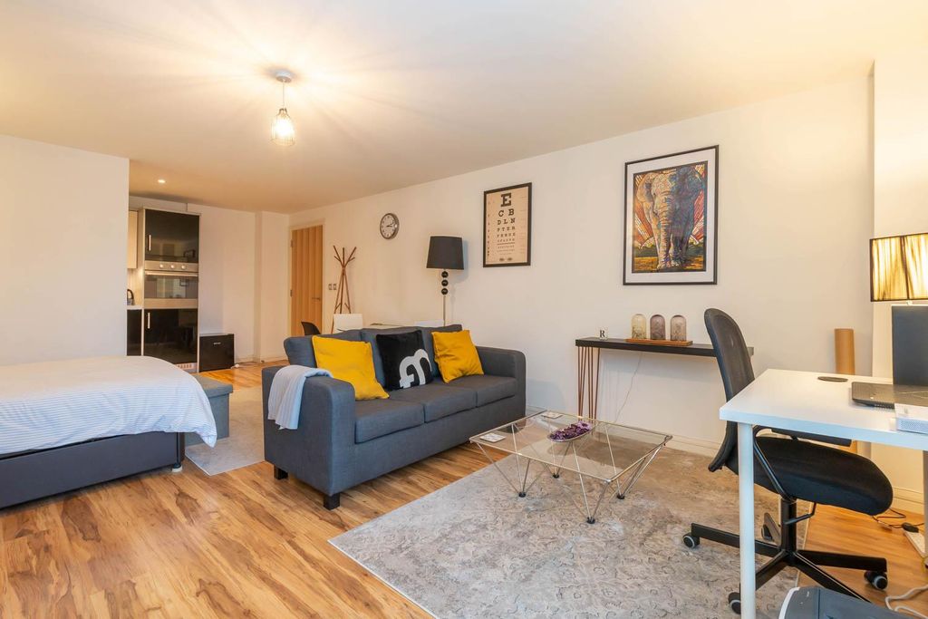 Property photo 1 of 8 Living Area