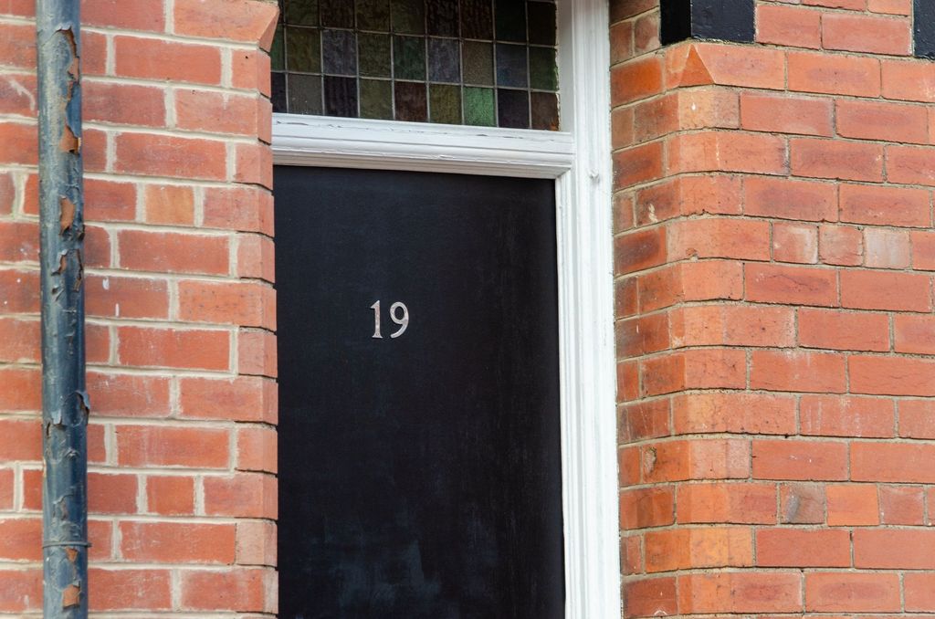 Property photo 1 of 6 Close-Up Of The Front Entrance Of A Charming Brick...