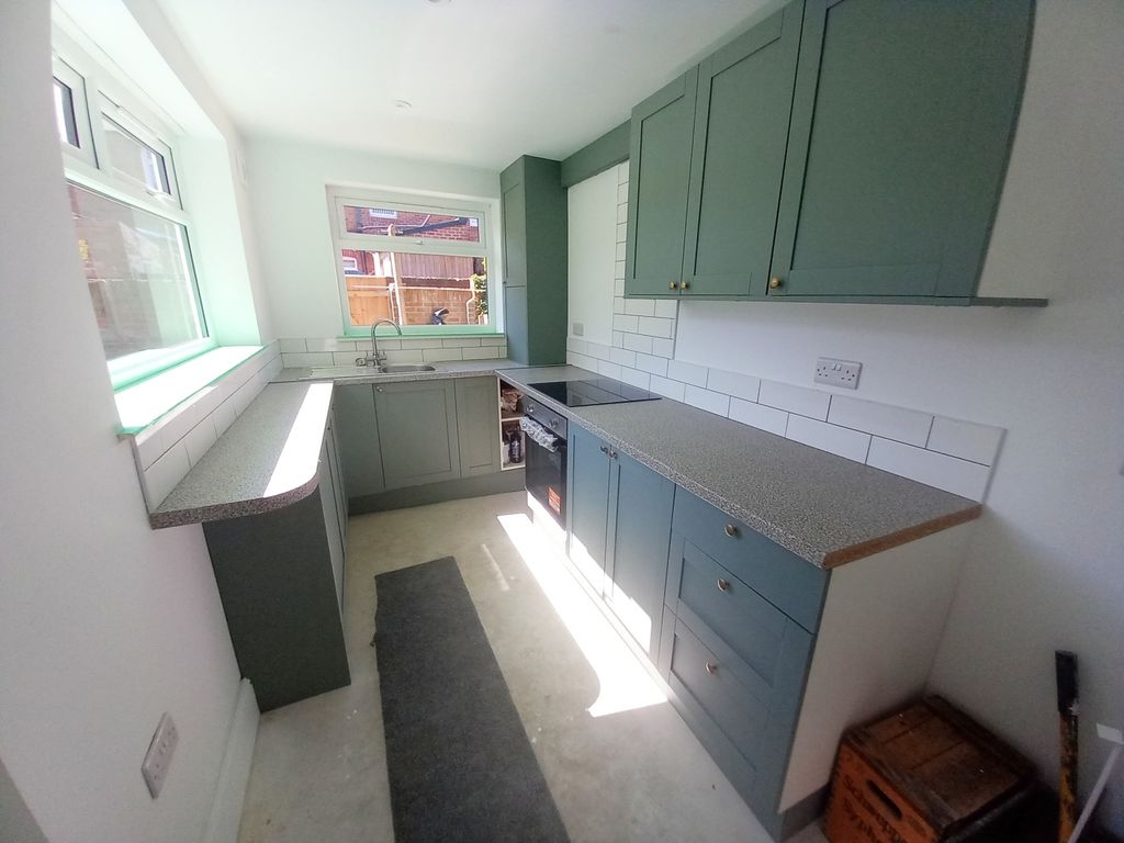 Property photo 3 of 8 Kitchen