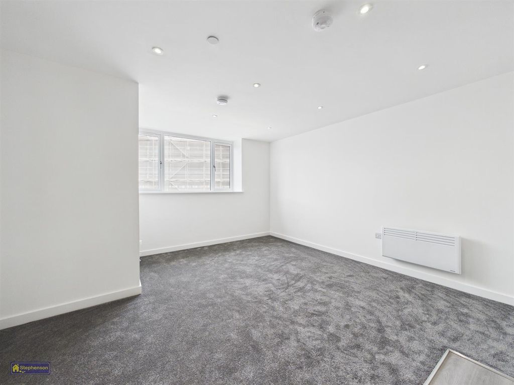 Property photo 3 of 7 Living Room Area
