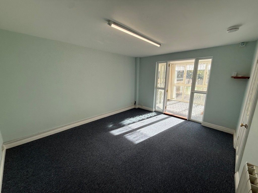 Property photo 3 of 14 Carpeted Reception Area With Doors To Lobby