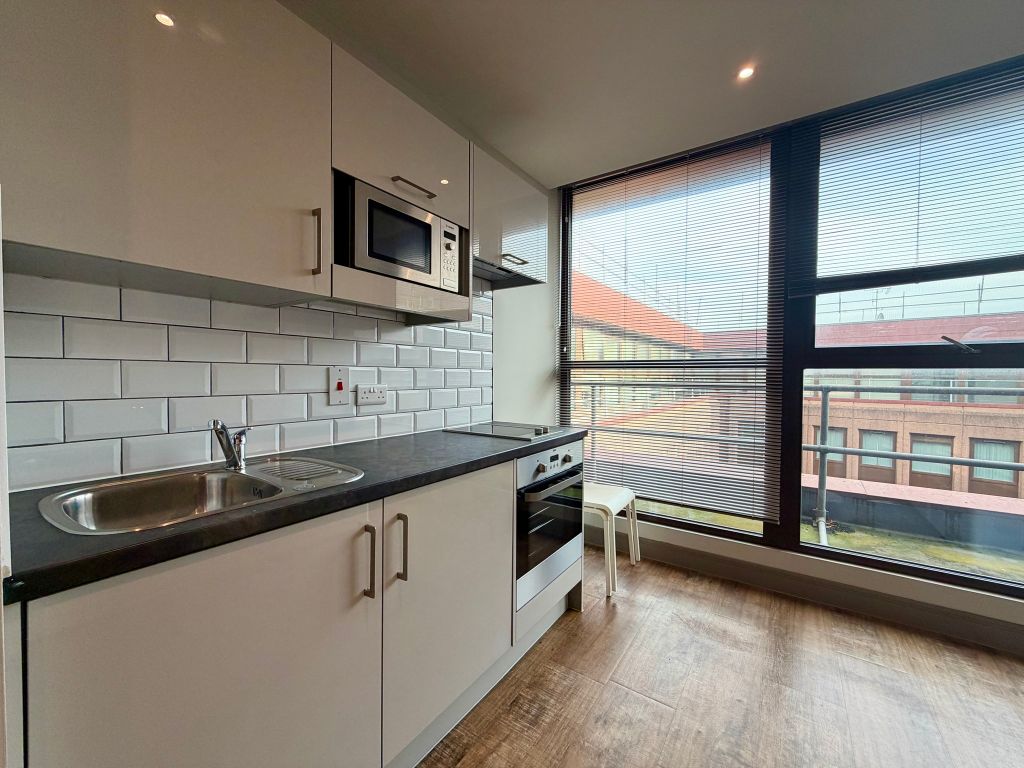 Property photo 2 of 12 Kitchen