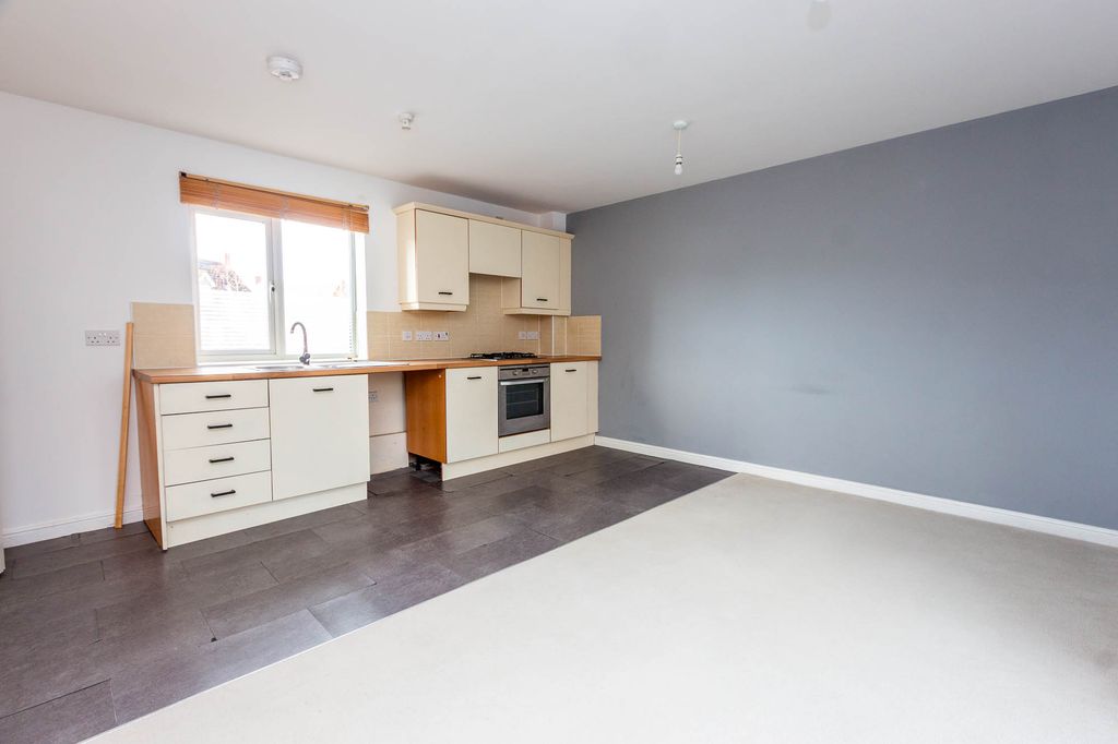 Property photo 3 of 9 Kitchen Area