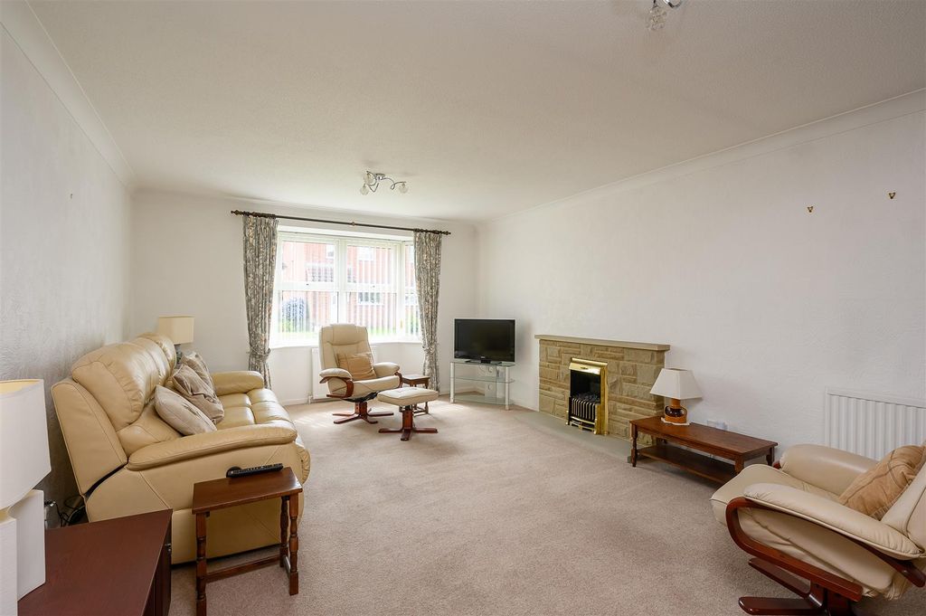 Property photo 2 of 13 Living Area