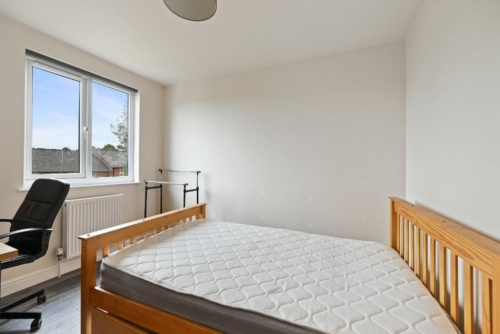 Property photo 3 of 13 Bright And Clean Double Bedroom Featuring A Simple...