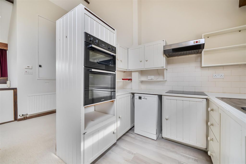 Property photo 3 of 12 Kitchen