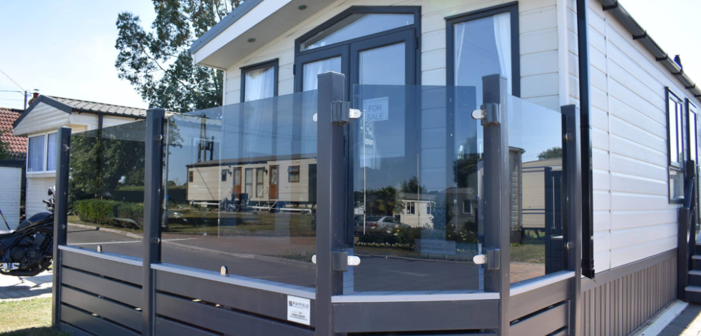Property photo 2 of 14 Front Decking Area With Glass Panels And Patio Doors On Holiday Caravan