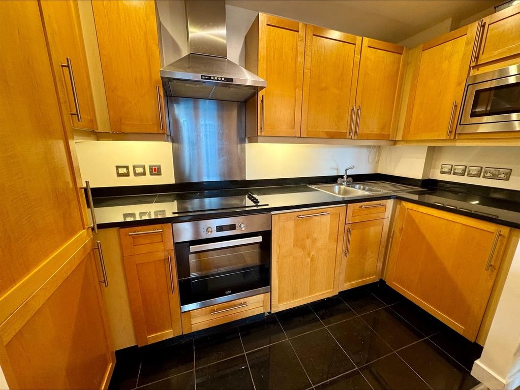 Property photo 3 of 9 Kitchen