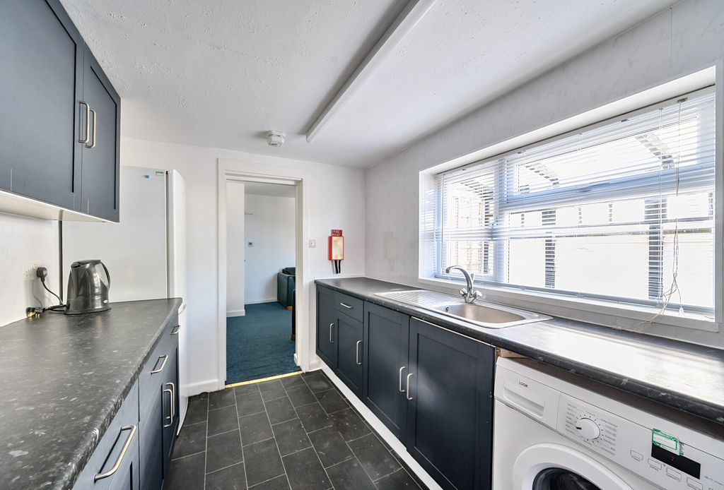 Property photo 3 of 13 Kitchen