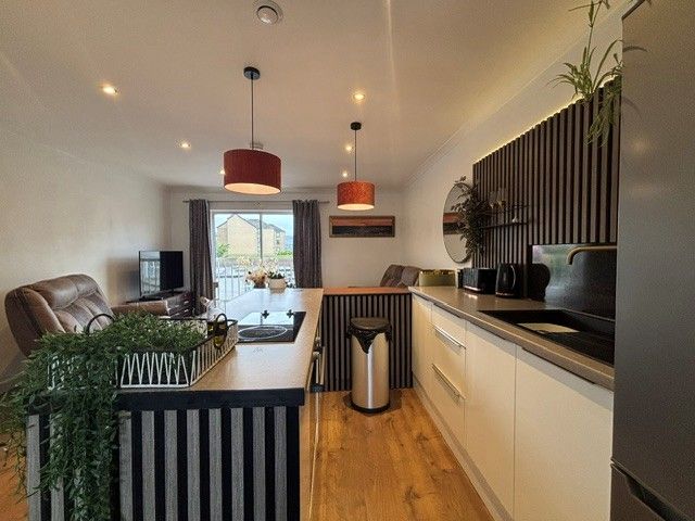 Property photo 3 of 13 Kitchen