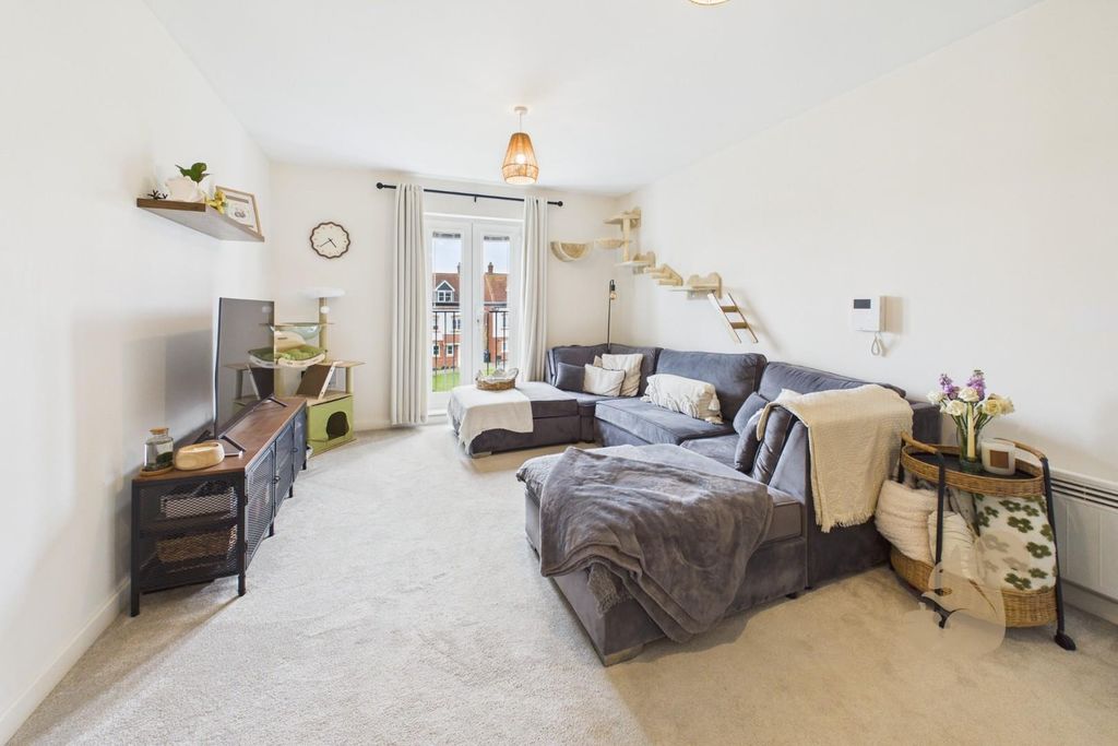 Property photo 2 of 9 Living Area