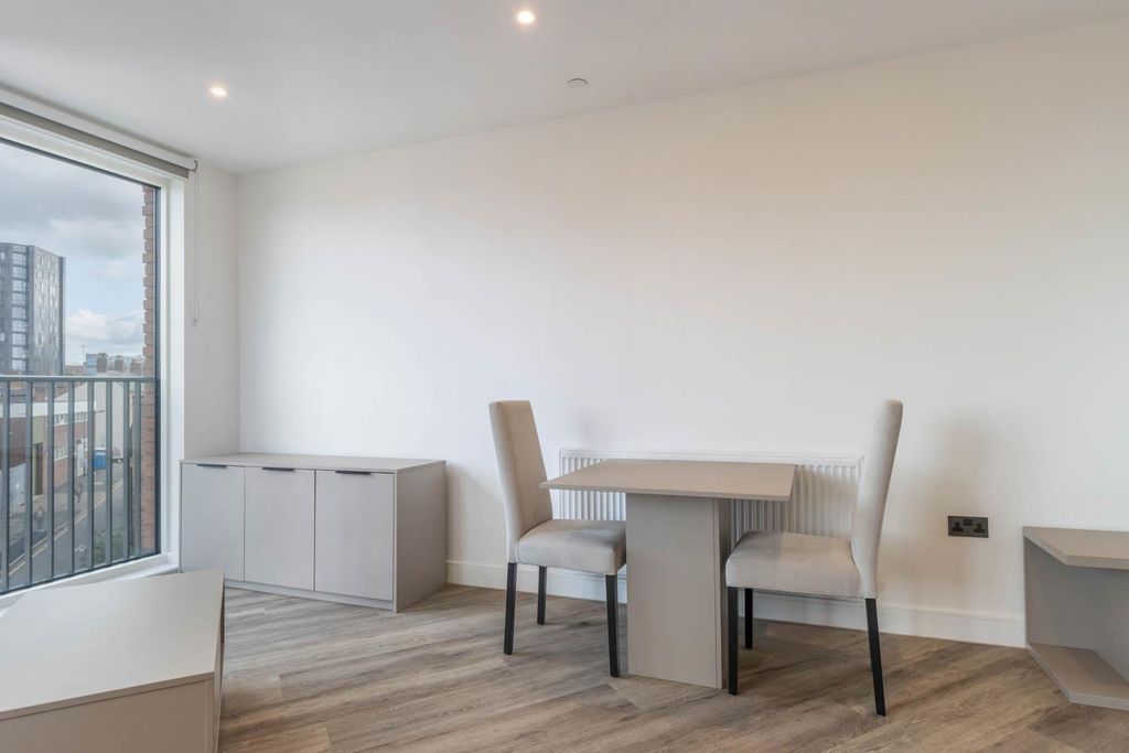 Property photo 3 of 24 Living Area/ Dining Area