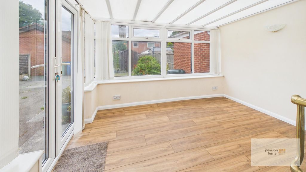 Property photo 3 of 12 Conservatory