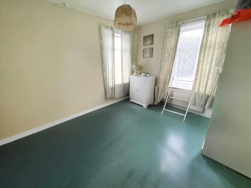 Property photo 3 of 8 Living Room: