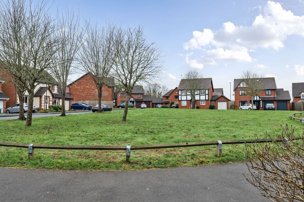 Property photo 3 of 19 Overlooks A Green (Front)