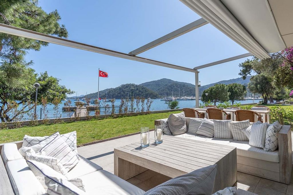 Property photo 1 of 27 An Attractive Seafront Garden Apartment In Gocek For Sale - Picturesque Views From The Veranda