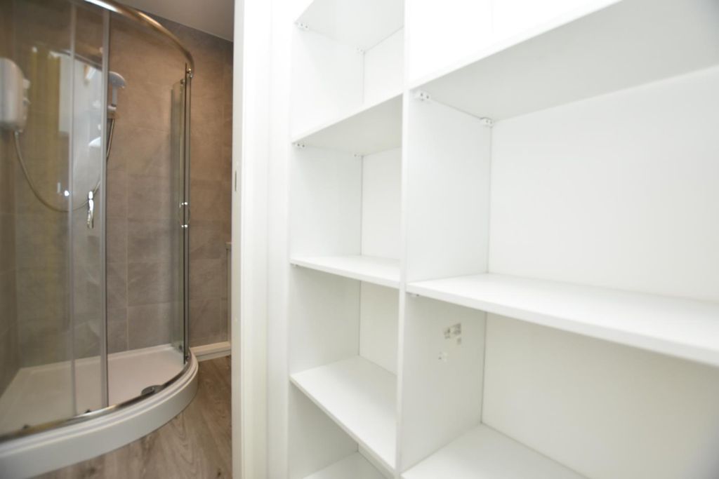 Property photo 3 of 7 Bathroom Hallway Storage Area