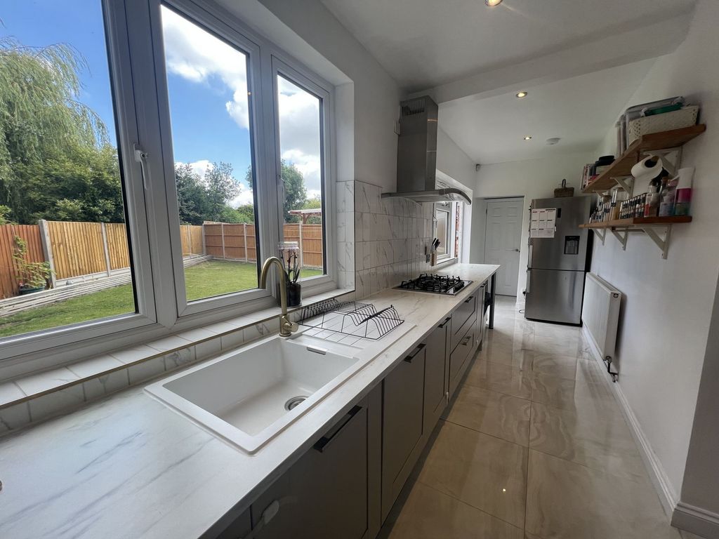 Property photo 3 of 12 Kitchen