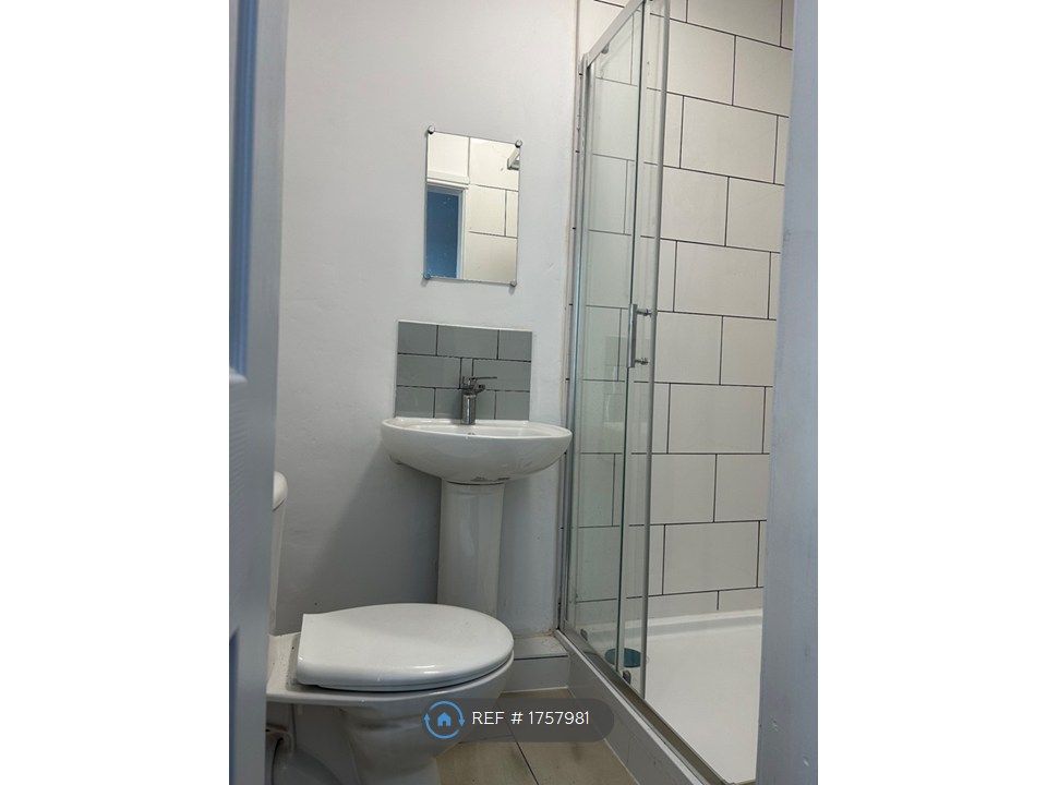 Property photo 2 of 8 Shower Toilet Basin