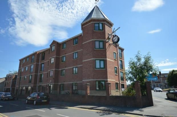 Property photo 2 of 7 Modern Brick Building Under A Bright Blue Sky...