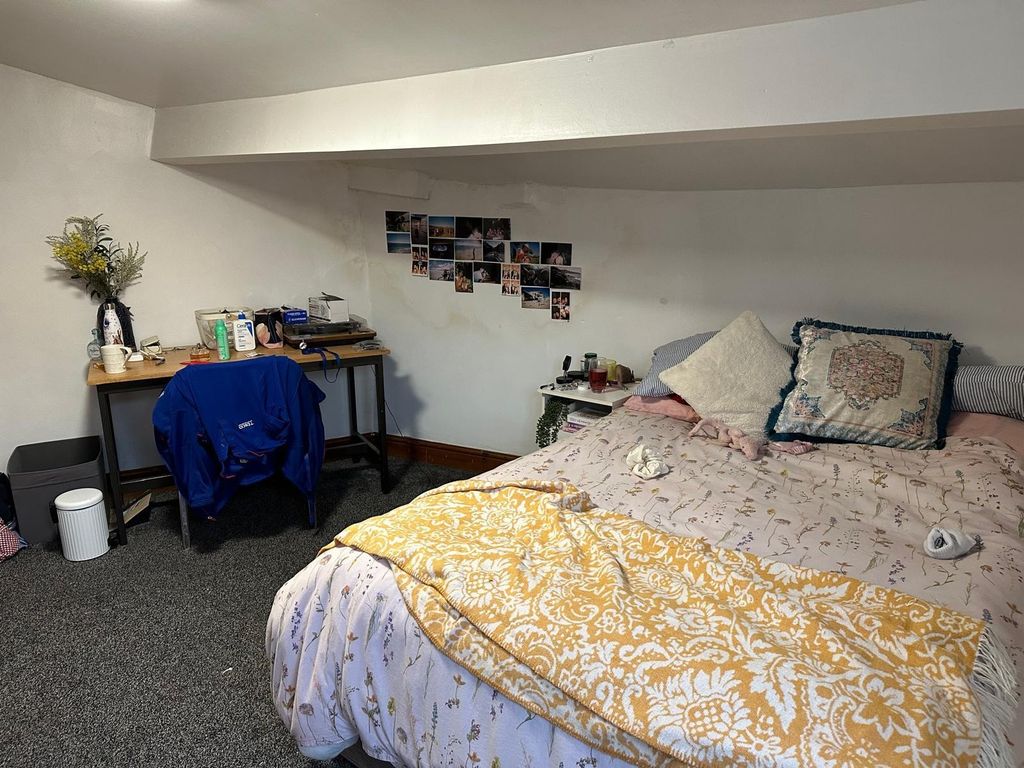 Property photo 2 of 10 A Cozy Bedroom With A Double Bed, Decorated With c...