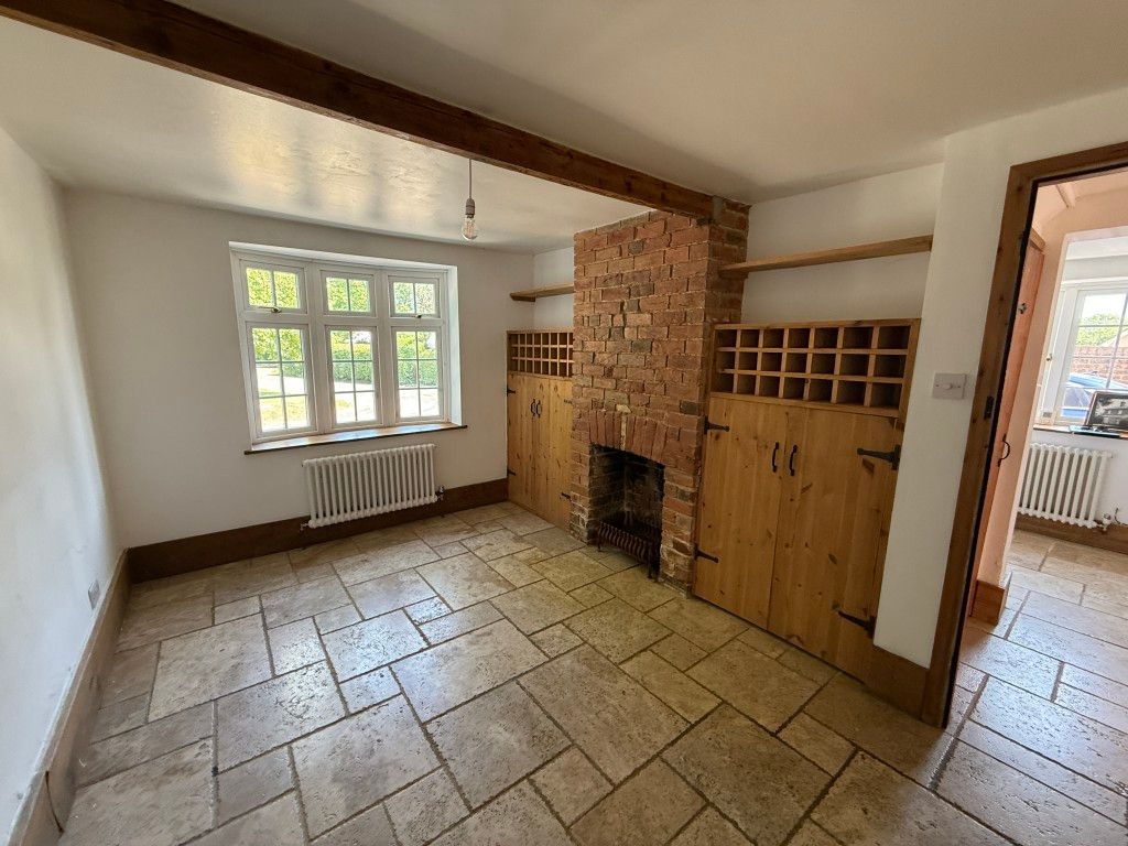 Property photo 3 of 15 Dining Room With Window To Front Fireplace, Storage And Wine Racking