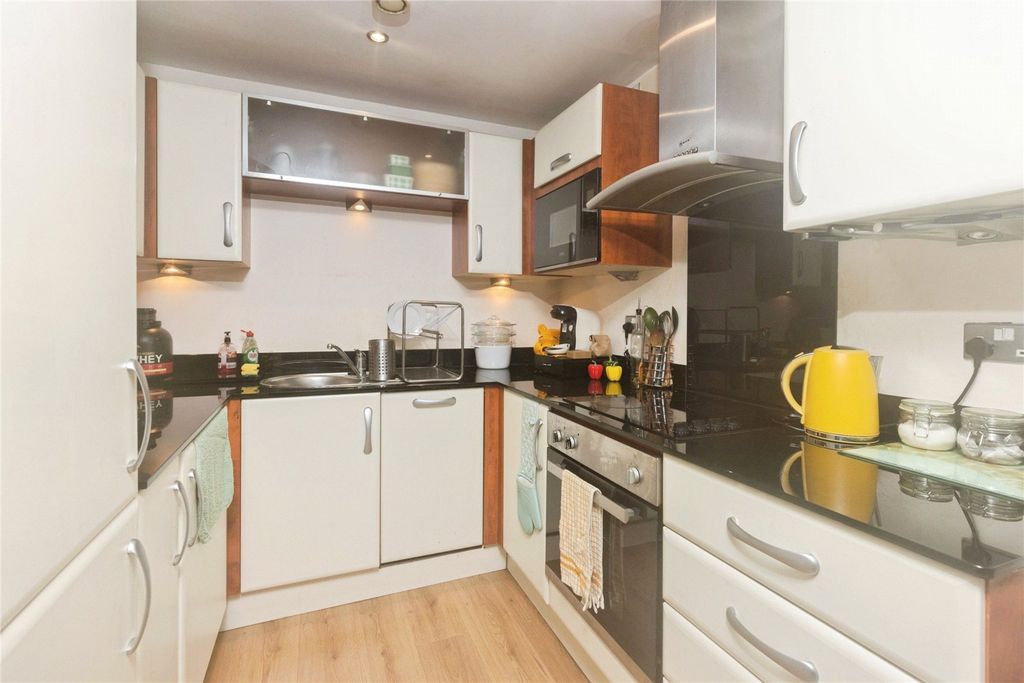 Property photo 3 of 12 Kitchen