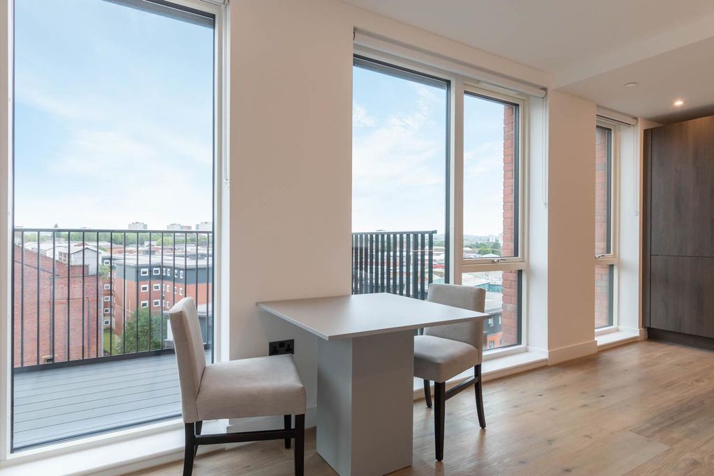 Property photo 3 of 23 Lounge/Dining Area