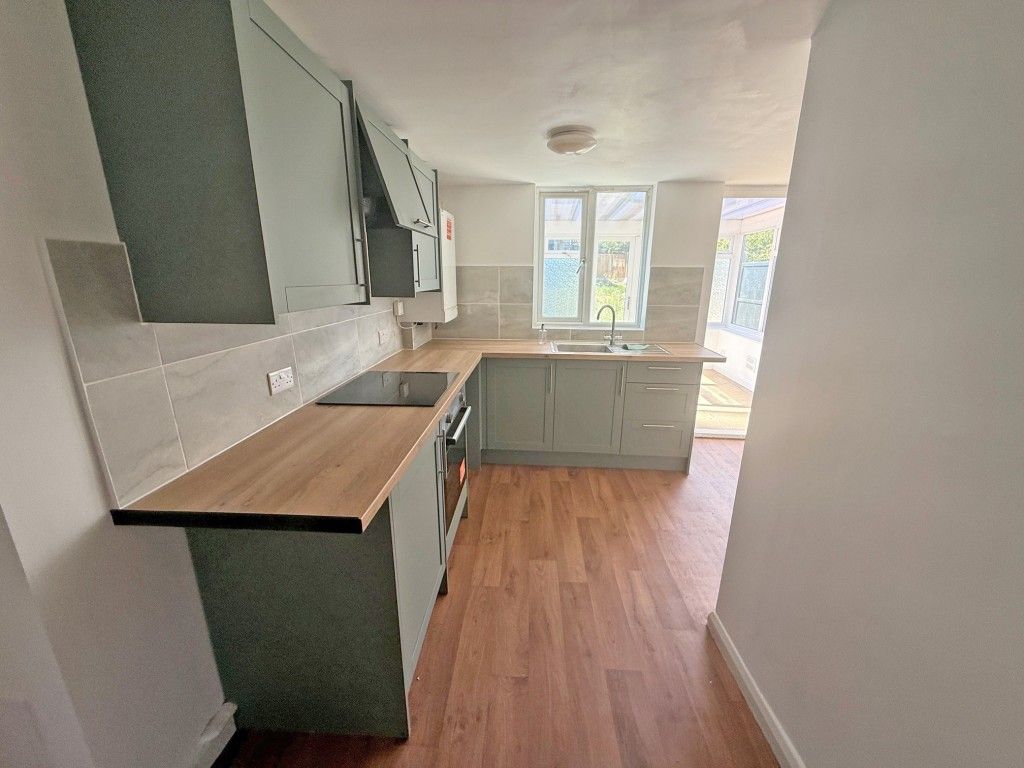 Property photo 3 of 13 Kitchen Area