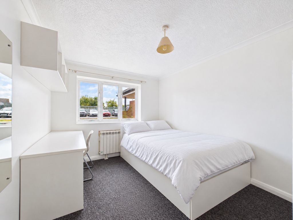 Property photo 3 of 5 Bright Minimalist Bedroom With Window View