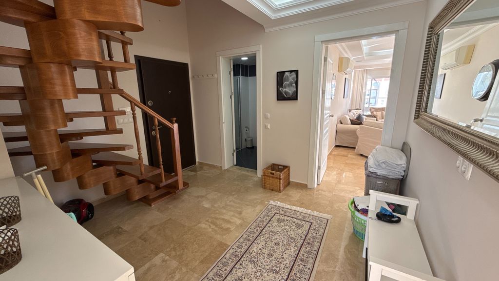 Property photo 2 of 23 Duplex Investment Property In Belek For Sale - Enrance Hallway With A Stunning Curved Staircase