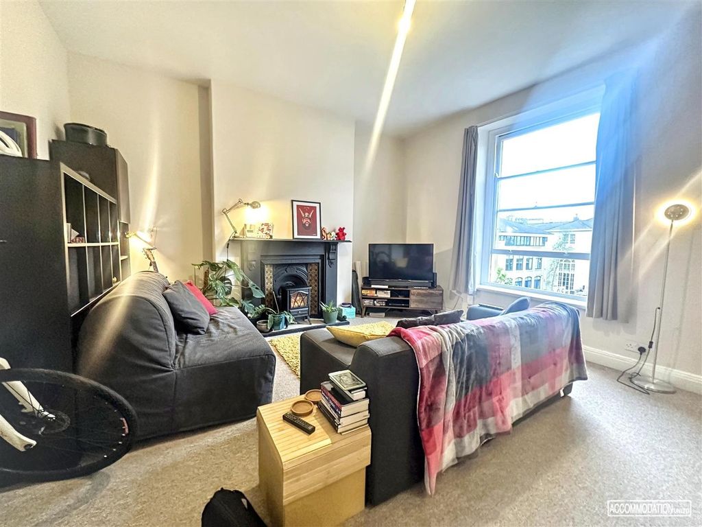 Property photo 2 of 6 Bright Lounge With Feature Fireplace And Window...