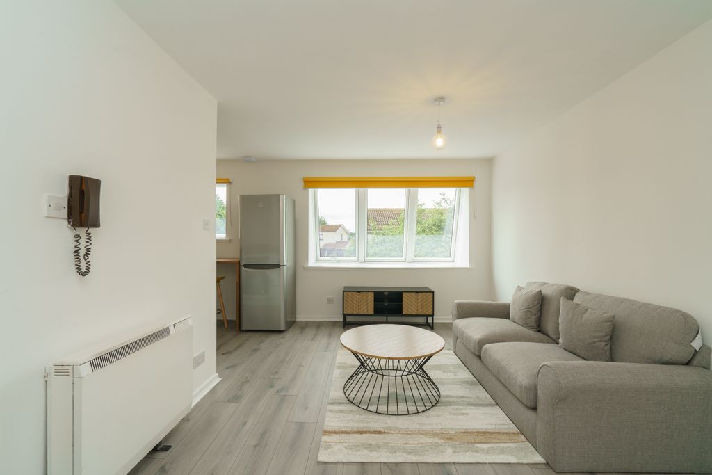 Property photo 3 of 11 6. Living Area Angle 3