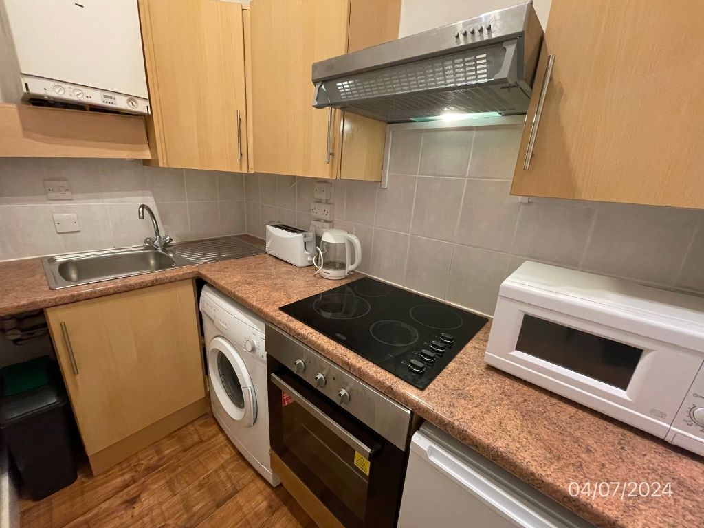 Property photo 2 of 8 Kitchen